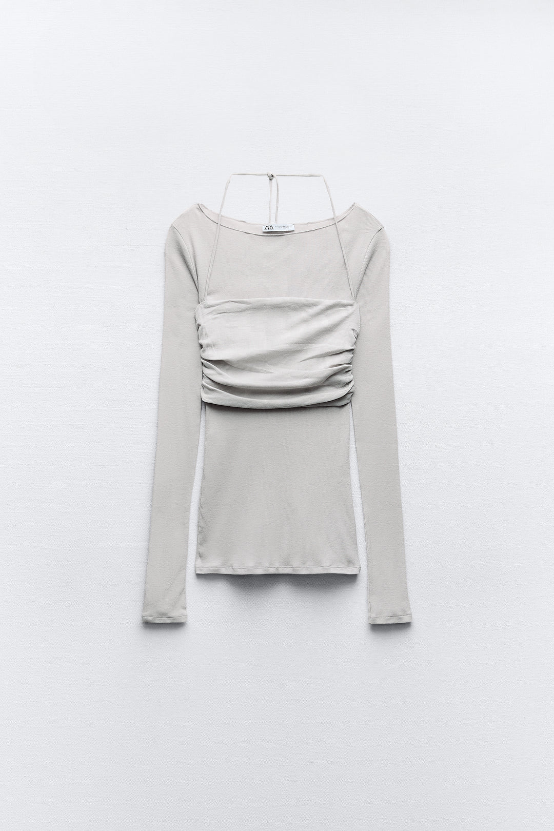 T-shirt semi-transparent court superposé manches longues