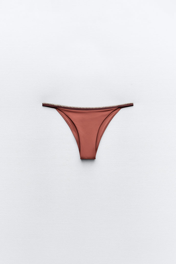 Bas bikini surpiqûres contrastées