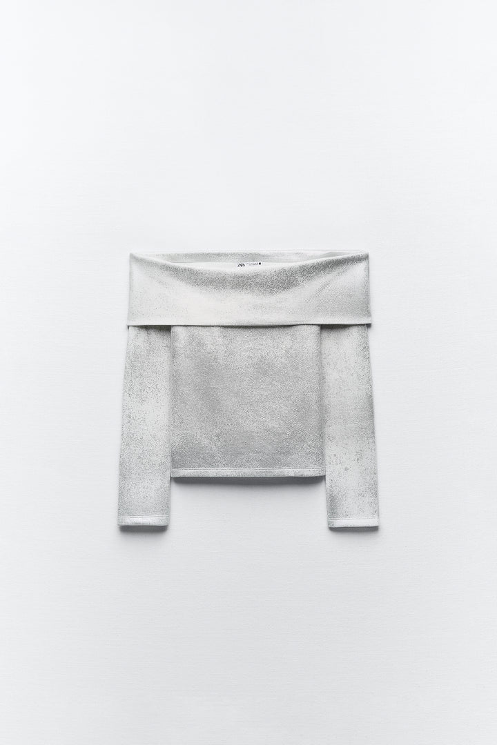 Pull épaules dénudées métallisé manches longues