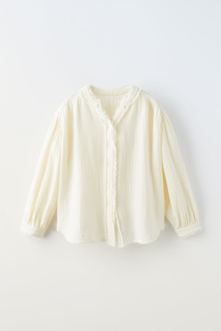 Blouson fille gaze de coton bords francs