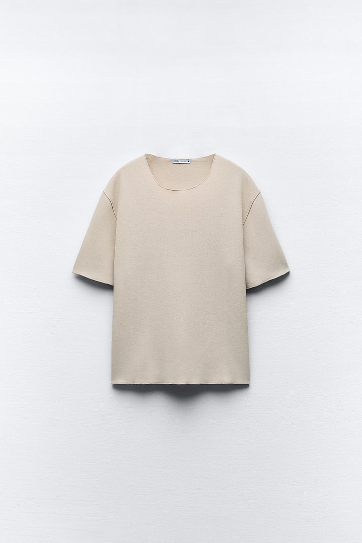Top minimaliste doux col rond manches courtes**