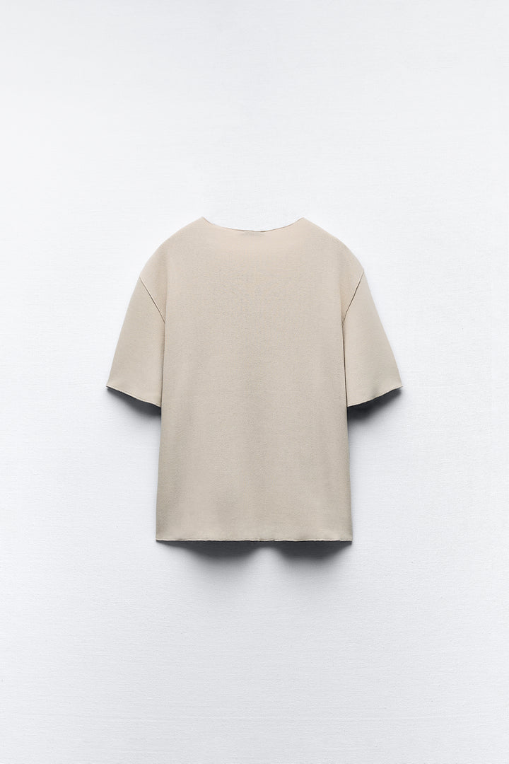 Top minimaliste doux col rond manches courtes**
