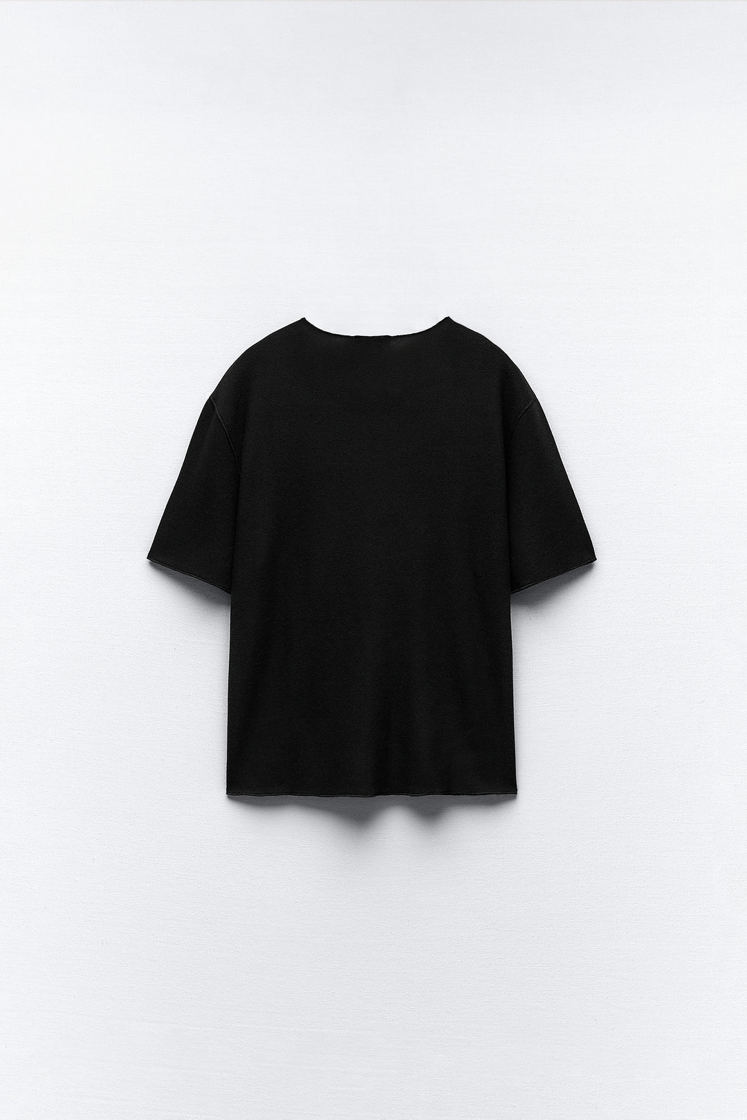 Top minimaliste doux col rond manches courtes