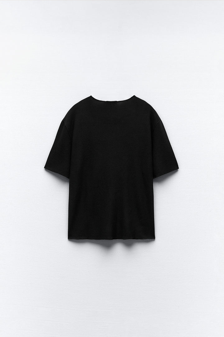 Top minimaliste doux col rond manches courtes