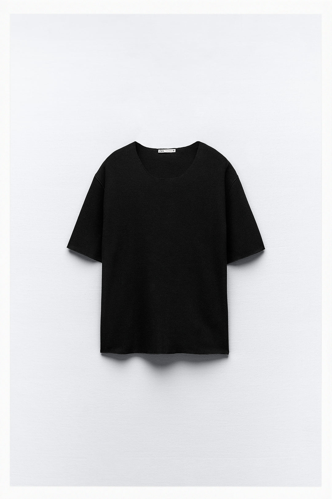 Top minimaliste doux col rond manches courtes