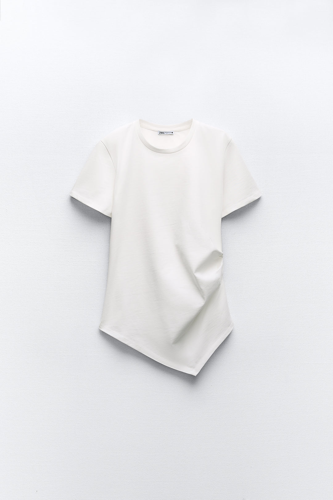 T-shirt coton froncé bas asymétrique col rond manches courtes**