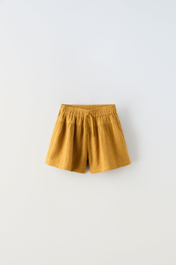 Bermuda fluide ocre structuré enfant