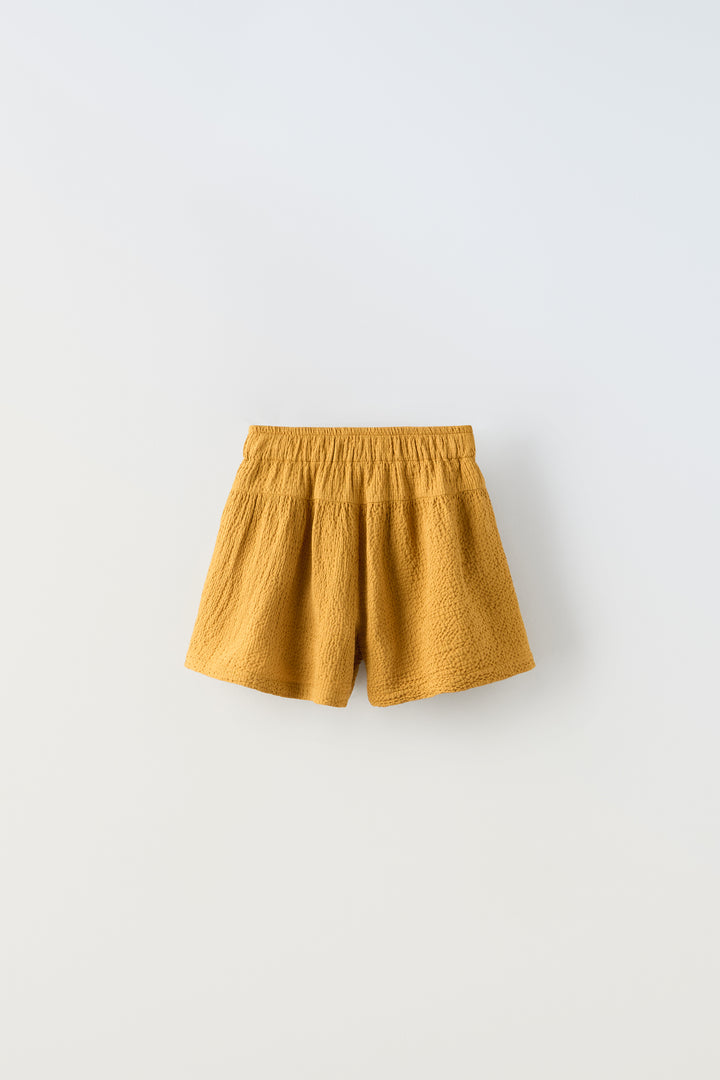 Bermuda fluide ocre structuré enfant