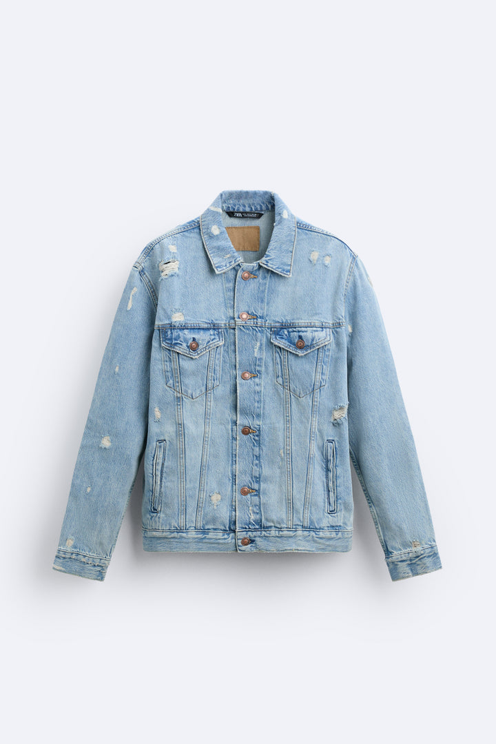 Veste denim abîmée