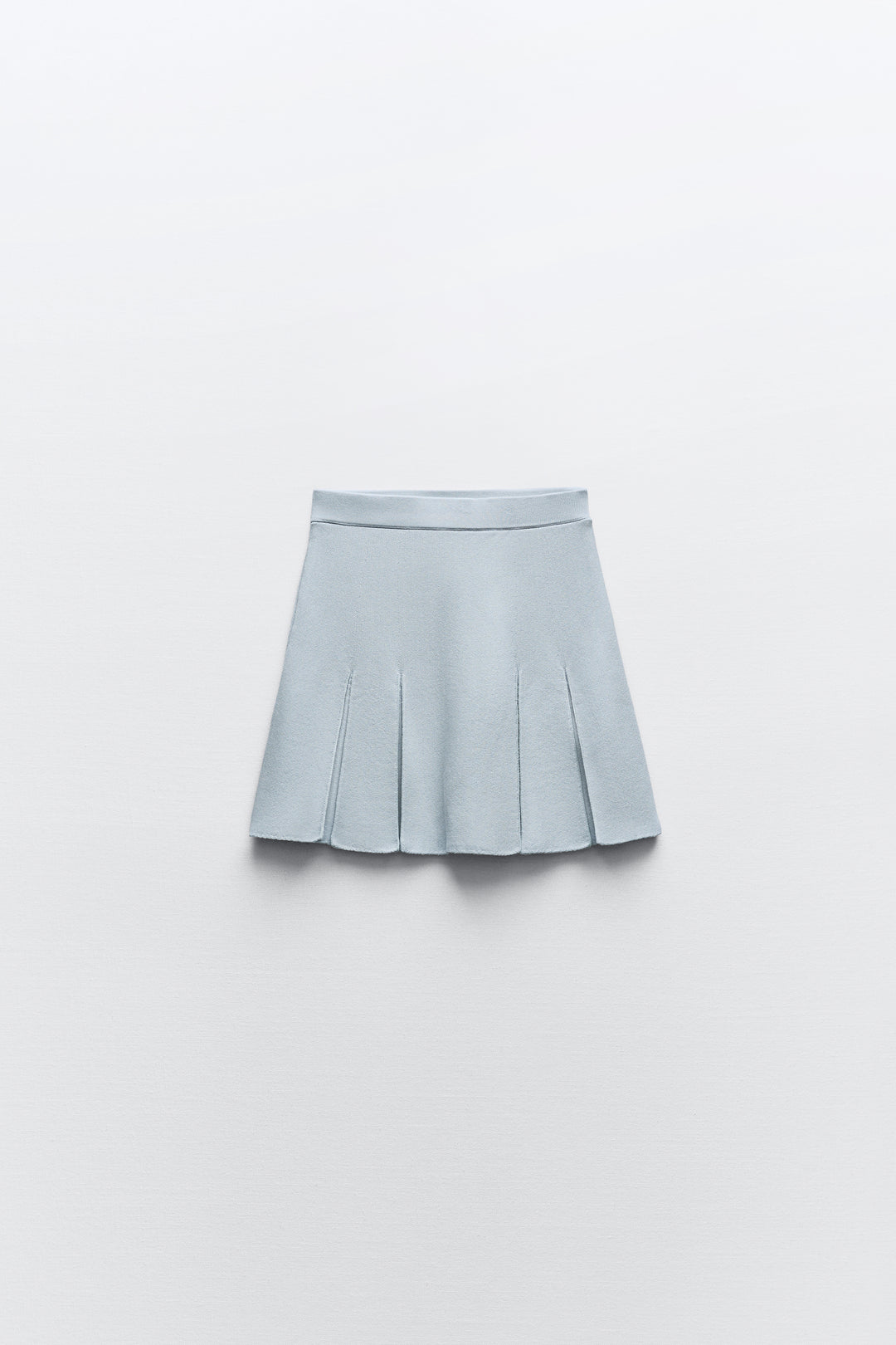 Mini-Jupe Plissée Bleu Clair Ensemble