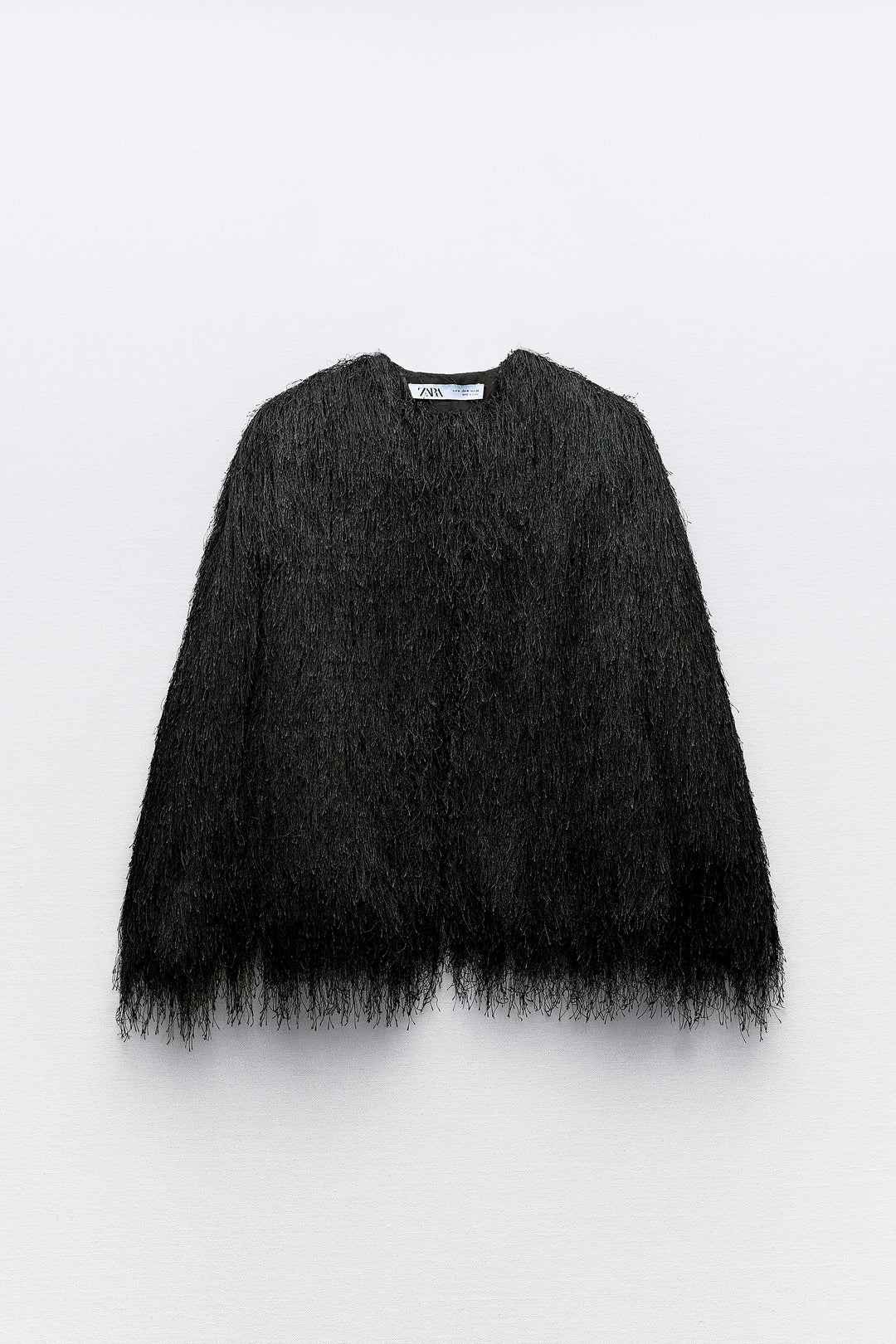 Veste carrée avec franges partout**