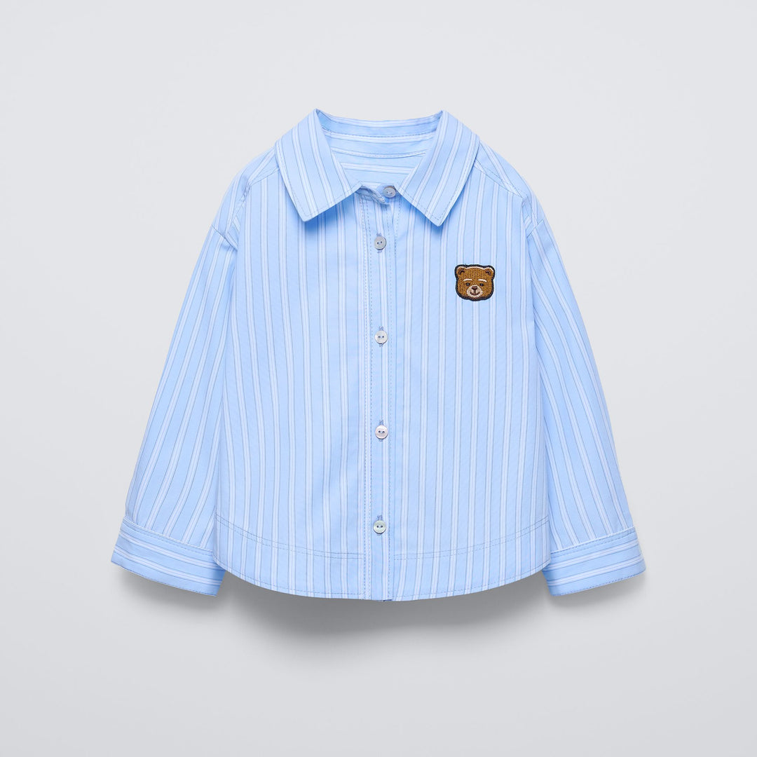 Moudda ZARA - Chemise rayée bleue patch ours - Tunisie 2