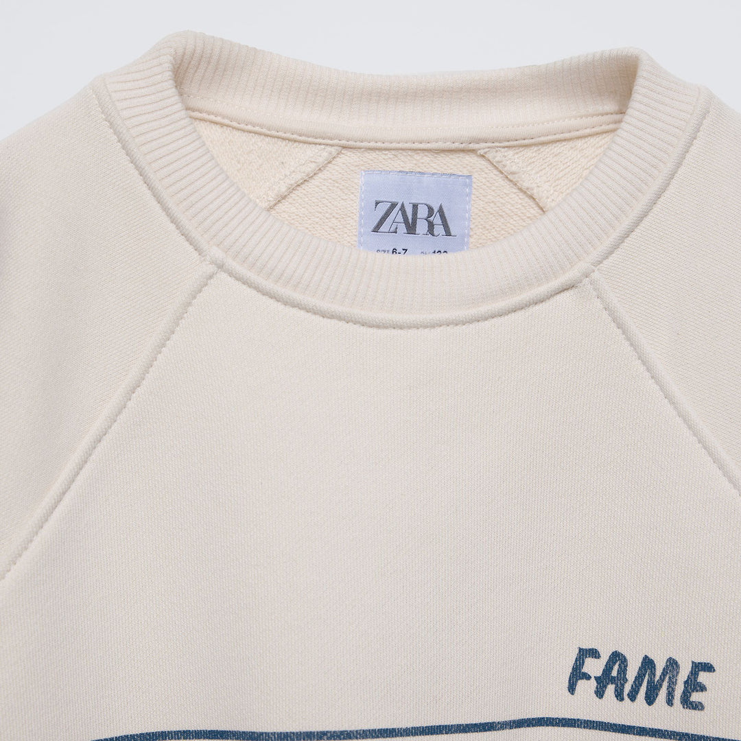 Moudda ZARA - Sweat coupe boxy, neutre avec rayures et imprimé - Tunisie 3